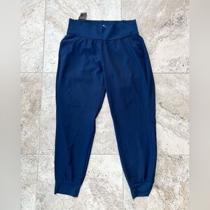 Adidas NWT Women's Essentials Solid Woven Golf Joggers, Collegiate Navy Blue, L